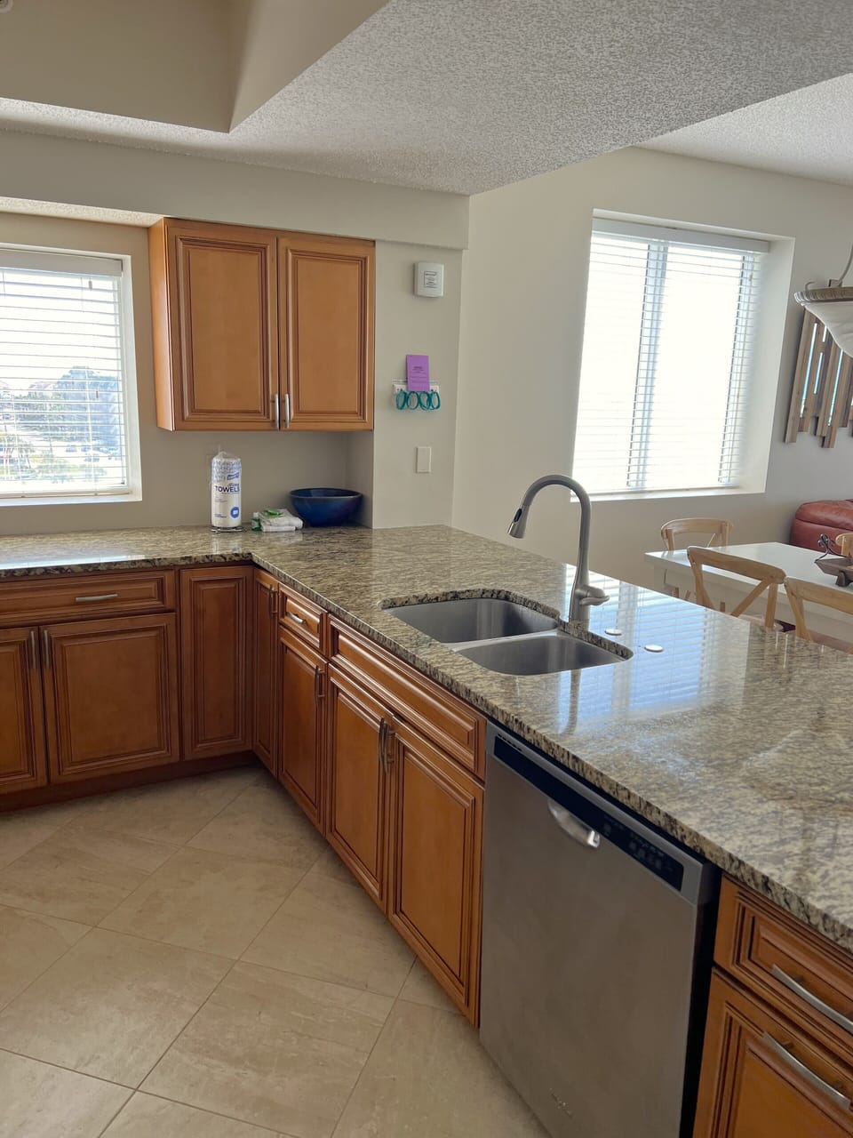 Fully stocked kitchen with custom maple kitchen cabintery.