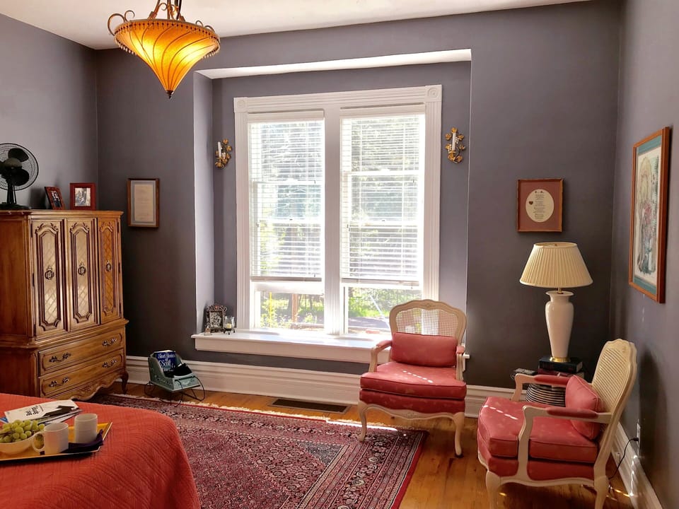 Relax, read a book, or just enjoy the sunny sitting  area of the master bedroom