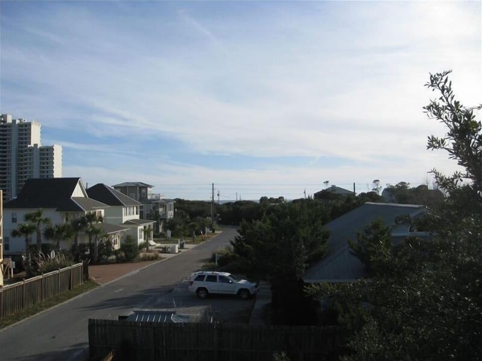 Peak of the ocean from the master bedroom plantation porch