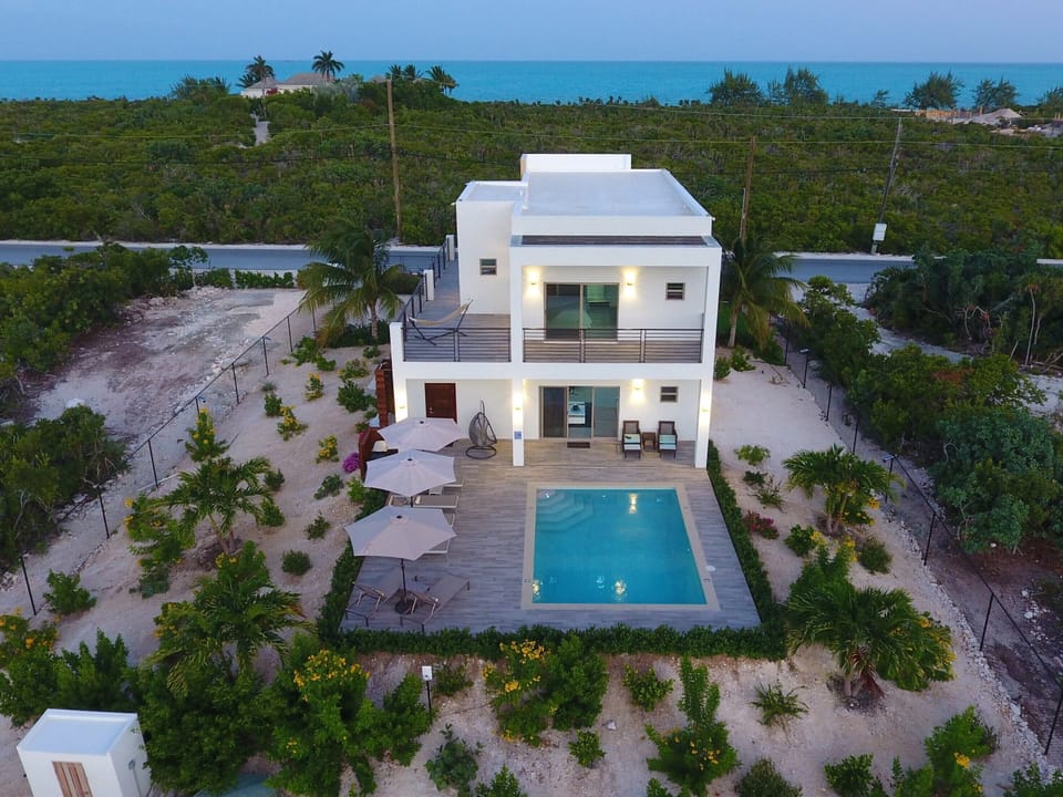 Aerial view of the back with Ocean and Pool view