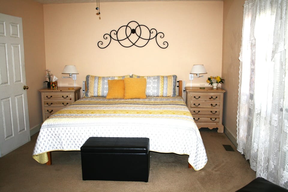 Master Bedroom w/King Bed, 26" TV, French Doors w/Seasonal Views