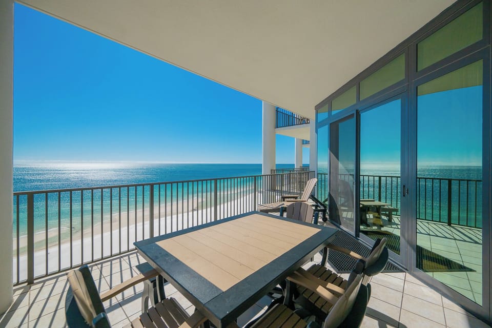 Savor the tranquil coastal views from your balcony while enjoying quality time with family around the balcony table