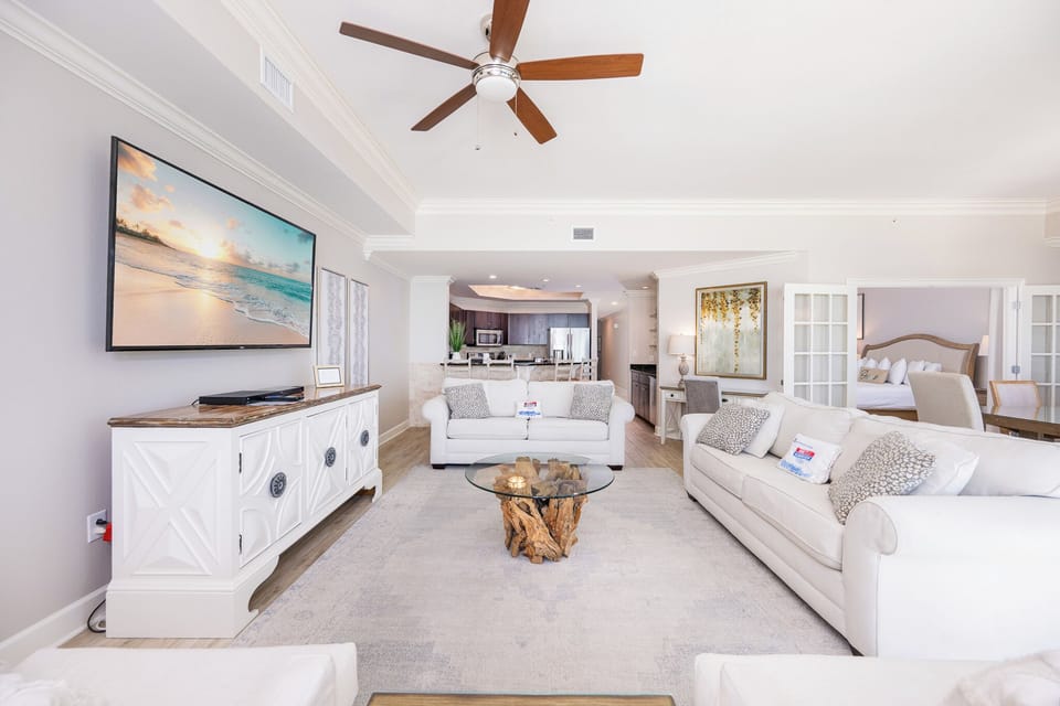 Unwind in the inviting living area, streaming your favorite shows as coastal light fills the space