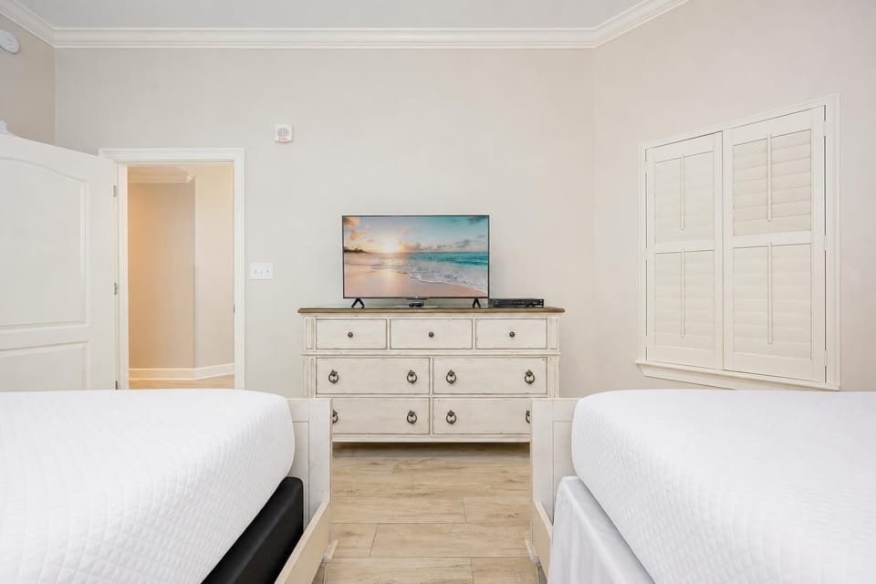 Relax and enjoy your favorite shows on the flat-screen TV while sinking into the plush beds of your cozy guest suite