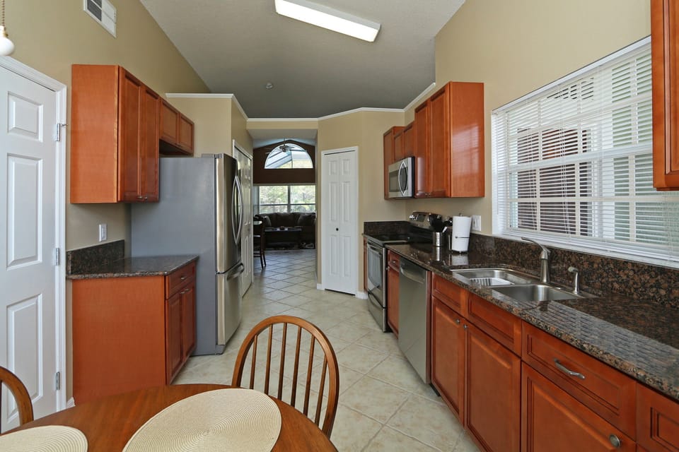 Alternative view of kitchen leading out to Great Room