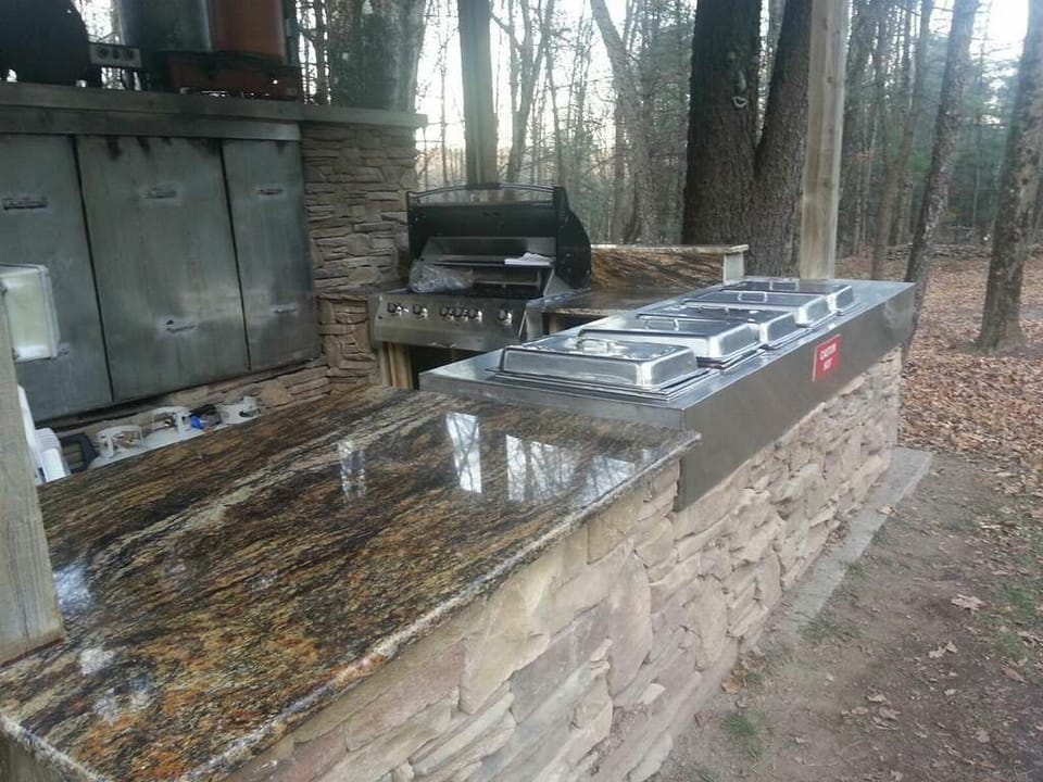 Grill Area - Large propane grill, hot bar for large cookouts, rotisserie grill (by special request).
