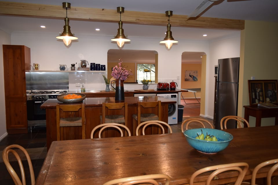 Large open plan dining room with fireplace