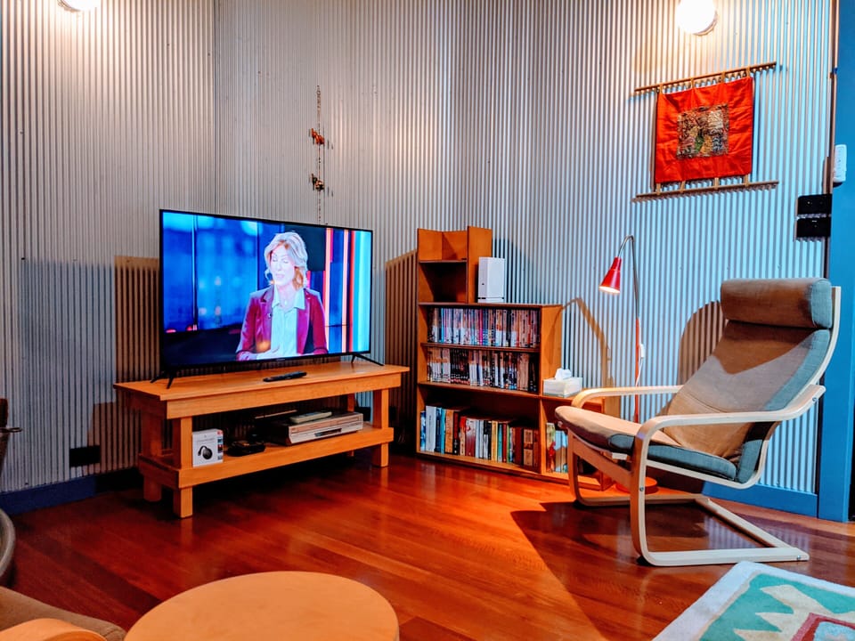 Lounge lower level - TV, Video Player and Video & Book library