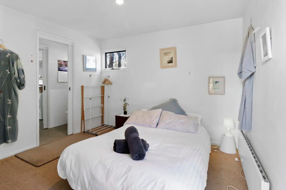 Downstairs bedroom with direct access to bathroom and living area