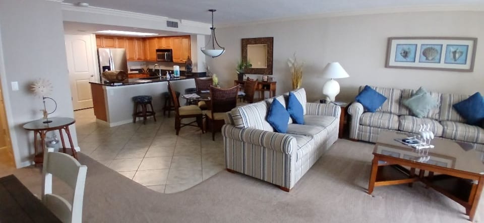 Well furnished 20' living area: 2 full size couches, armchair, TV and games.
