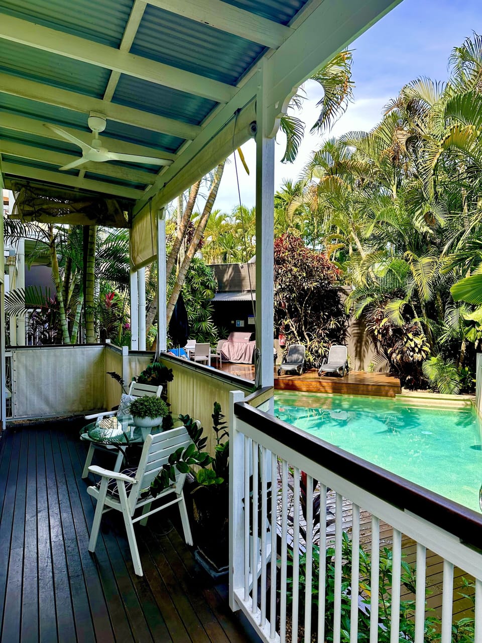 Private balcony overlooking the pool