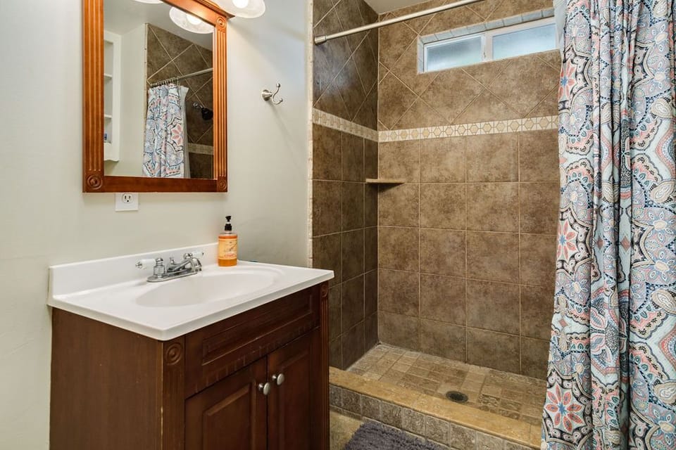Hallway bath with nice walk in shower...
