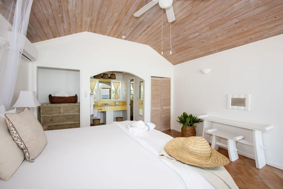 Yellow Building room with king bed
