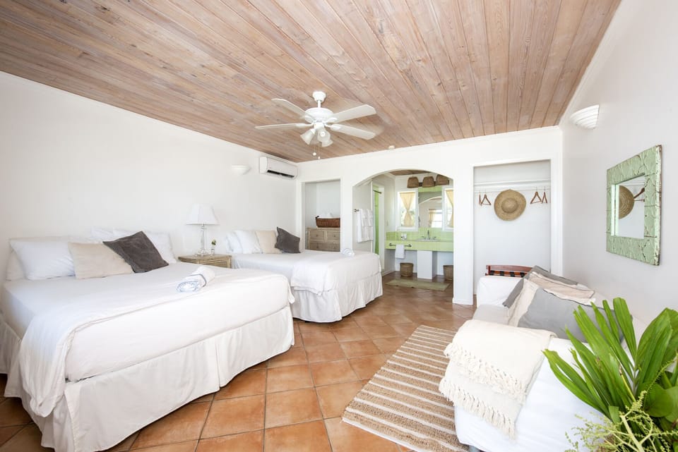Green Building room with two double bed.