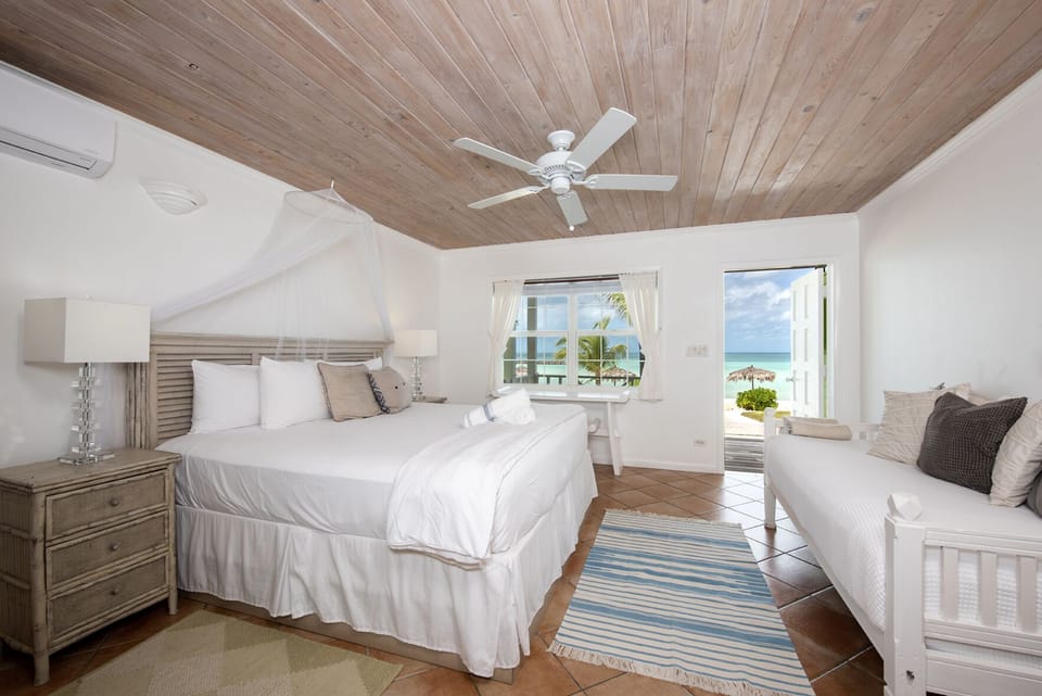 Green Building room with king bed and twin bed.