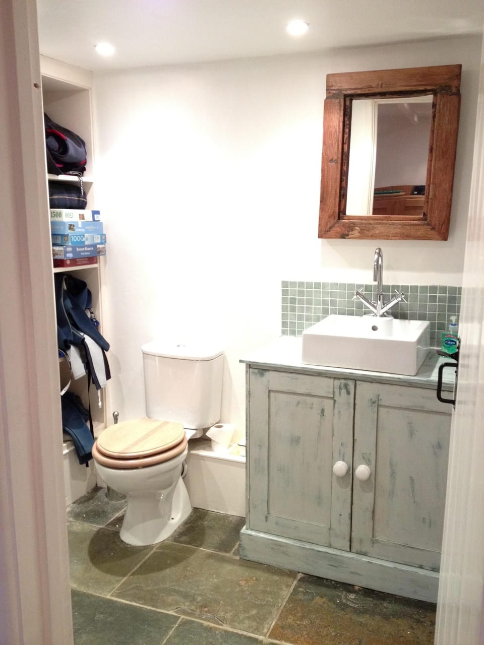 Downstairs bathroom with a great shower and wetsuits you can borrow