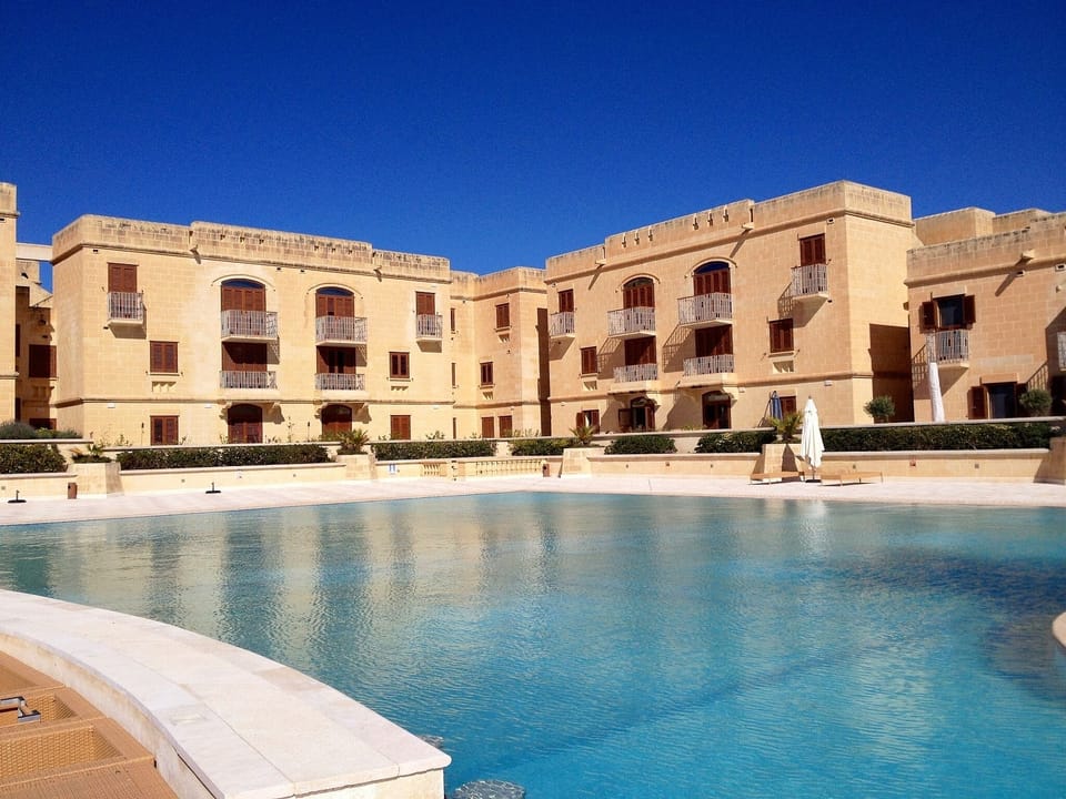 External view of apartment overlooking pool