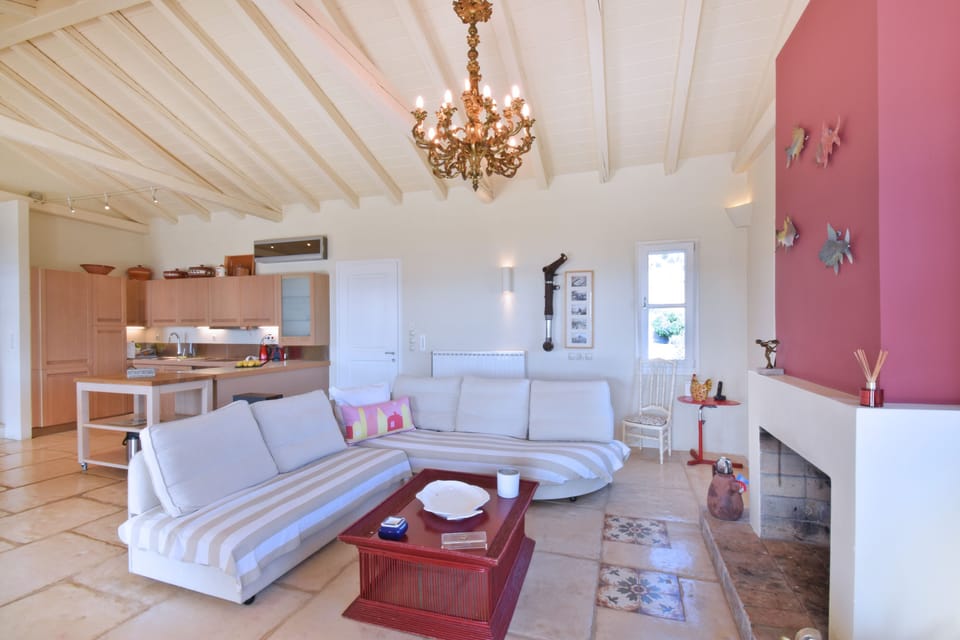 Living room, kitchen and front entrance.