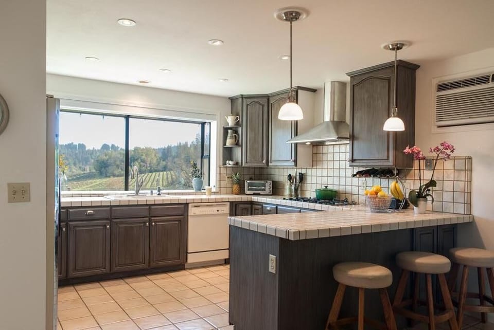 New 5-burner gas cooktop, double electric ovens.Just added new fridge/dishwasher