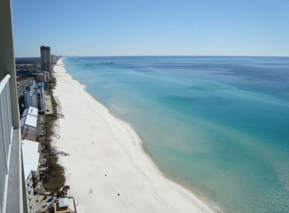 Eastward balcony view of coast line and gulf from this gorgeous Penthouse