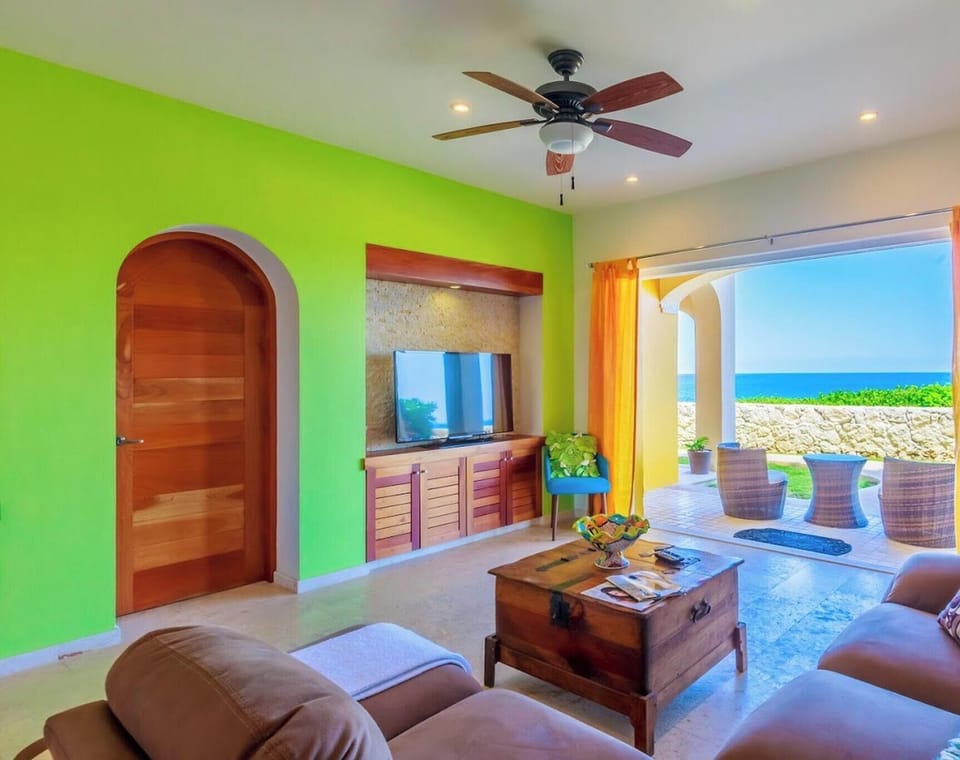 Ocean view living area with Cable TV