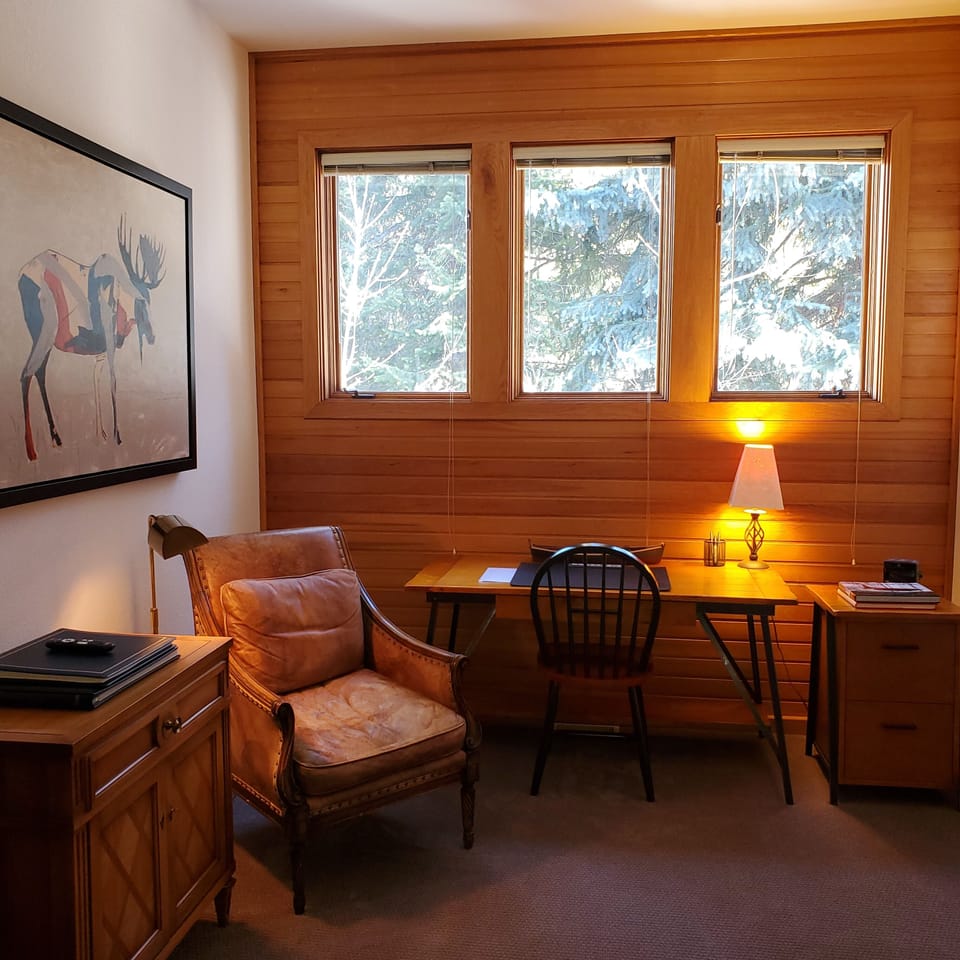 Spacious master bedroom suite is at the end of the hallway for privacy.