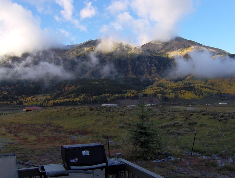 Whetstone in clouds from deck in Fall