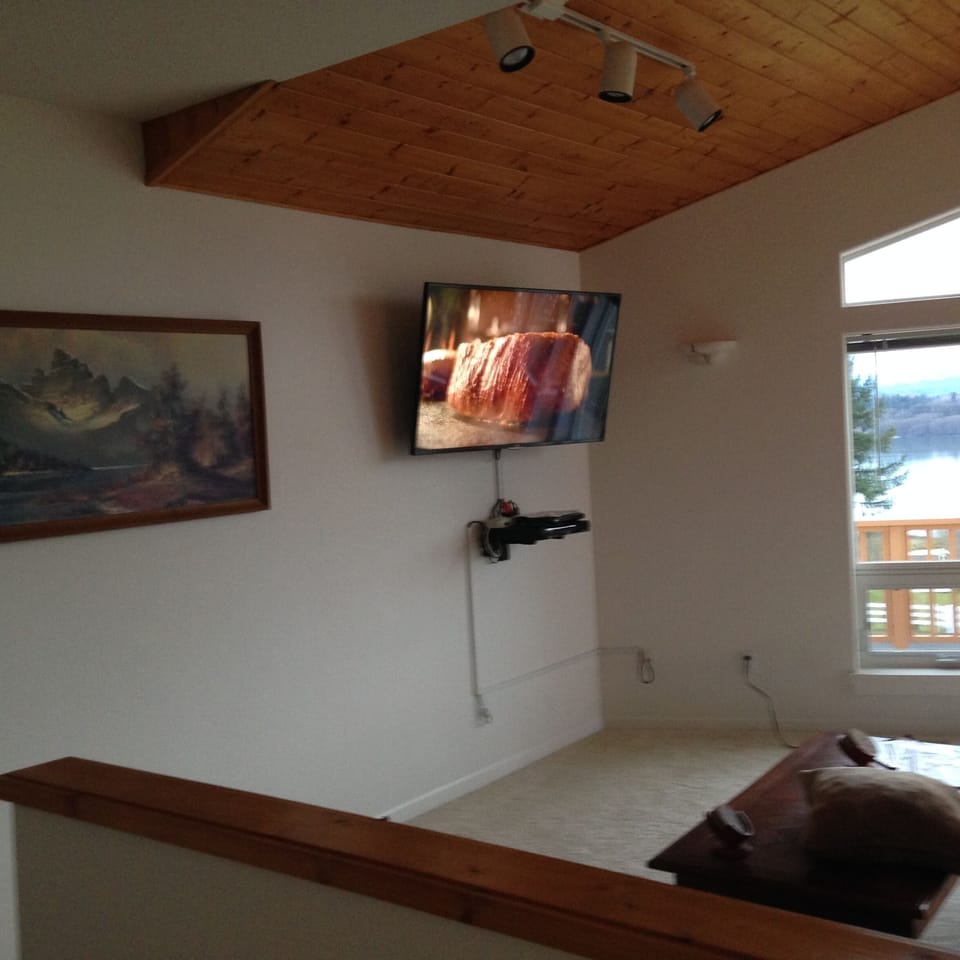 Large HD television in upstairs living room.