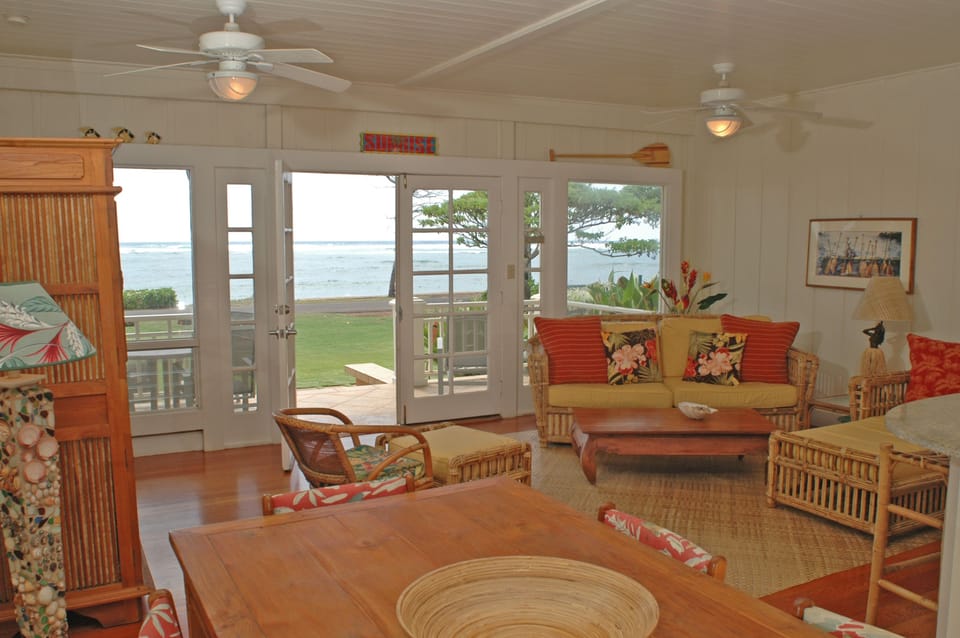 Teak, rattan, and island-style fabrics lend a comfortable tropical flavor.