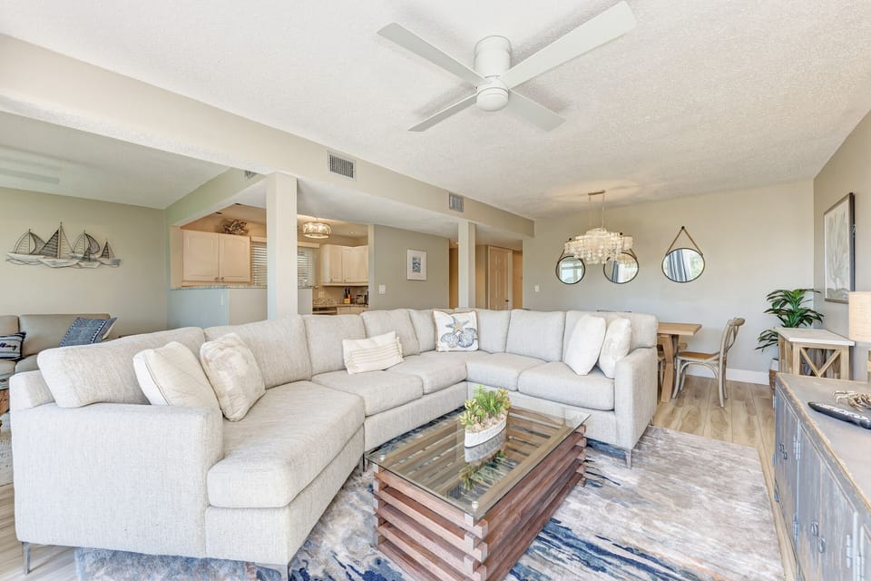 Relax on the sectional couch in the living room watching the game, show, movie..
