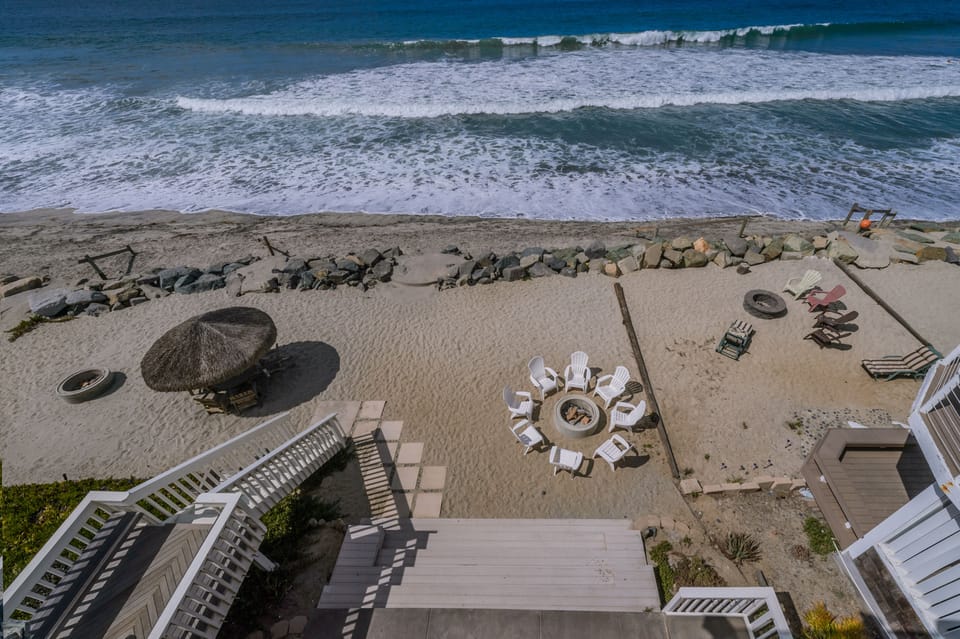 View of private beach from upstairs deck.