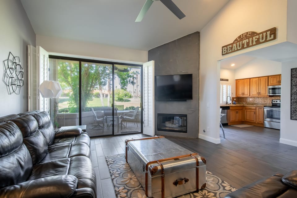 Gas fireplace and large flatscreen.  Smart TV's and cable in every room.