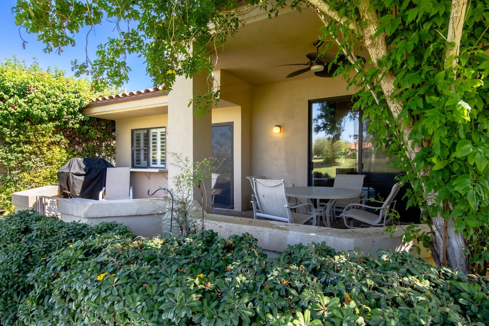 Back patio with gas BBQ and plenty of seating.

