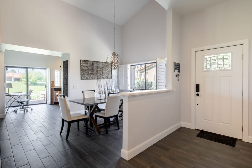 Dining room, kitchen and entry.
