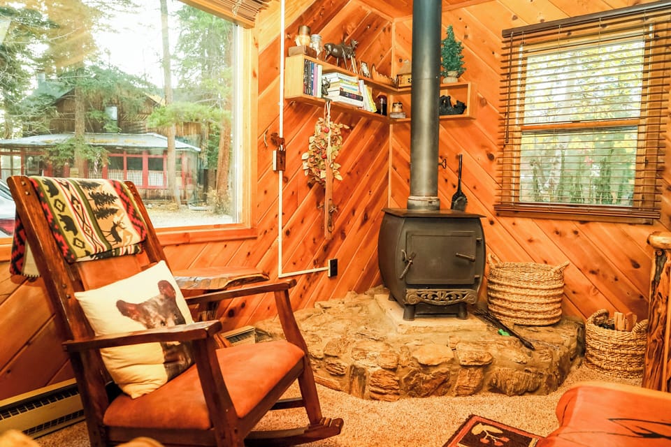 Wood burning stove in living room. You can buy wood at Mountain Market. 
