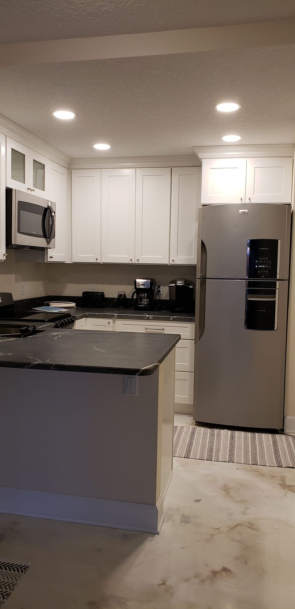 Modern kitchen with stainless steel appliances 