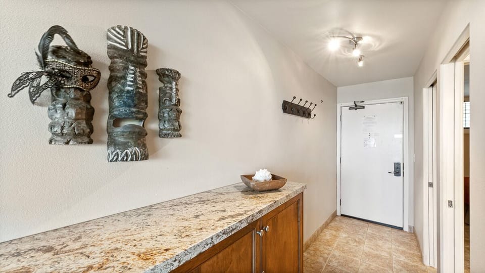 Hallway storage cabinet with original art