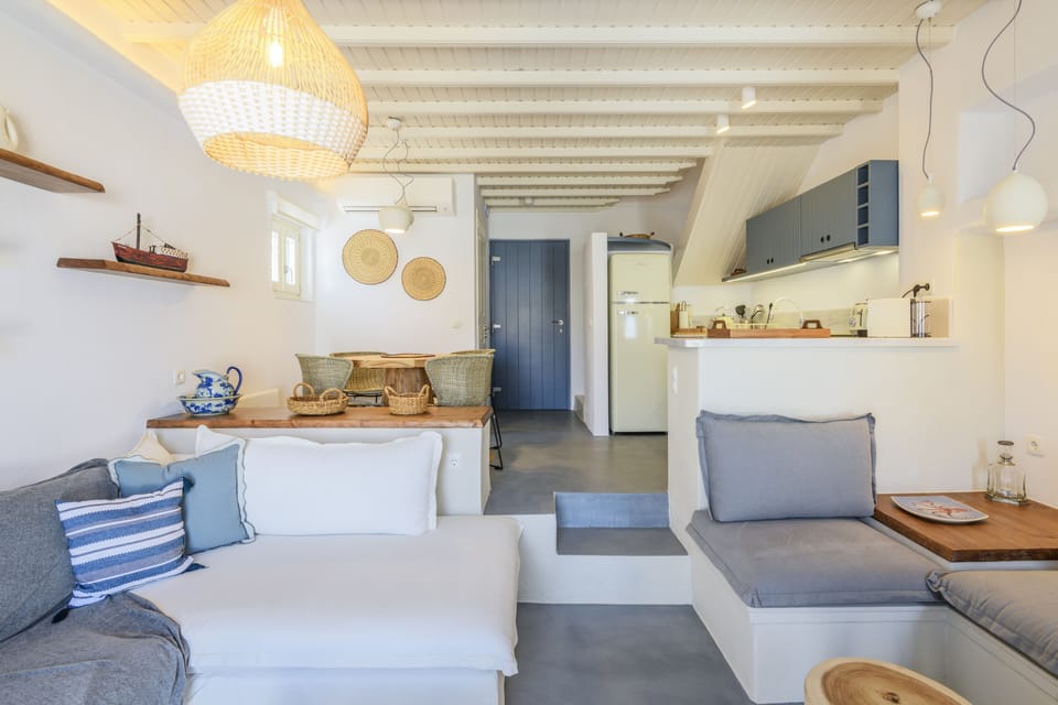 Living room, dining table and kitchen