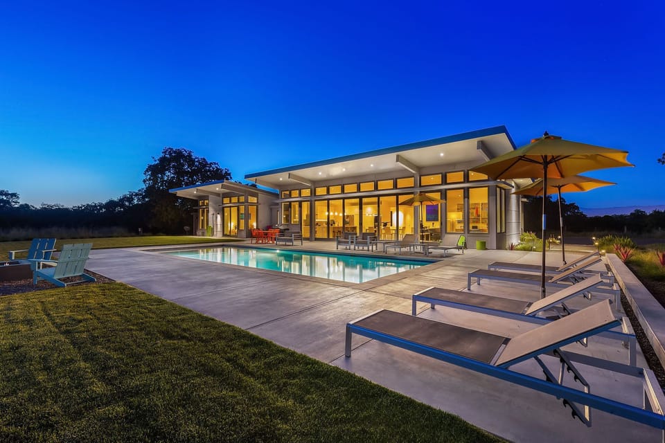 Night Time Magical Pool Side That Embodies Indoor | Outdoor Living!