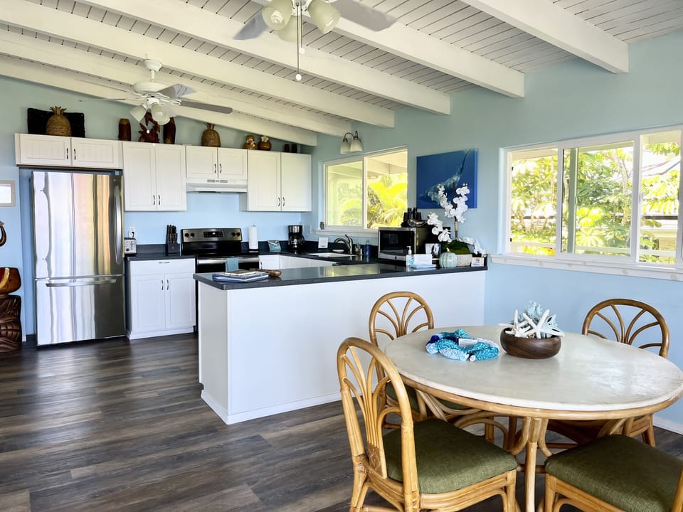 Full kitchen and dining room.