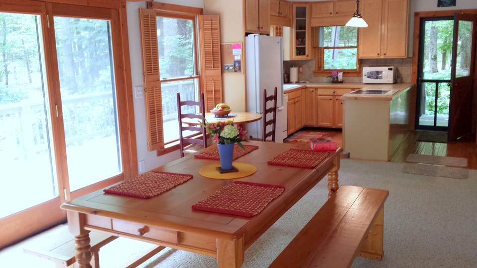 Big farm-style dining table, big enough for a crowd. 