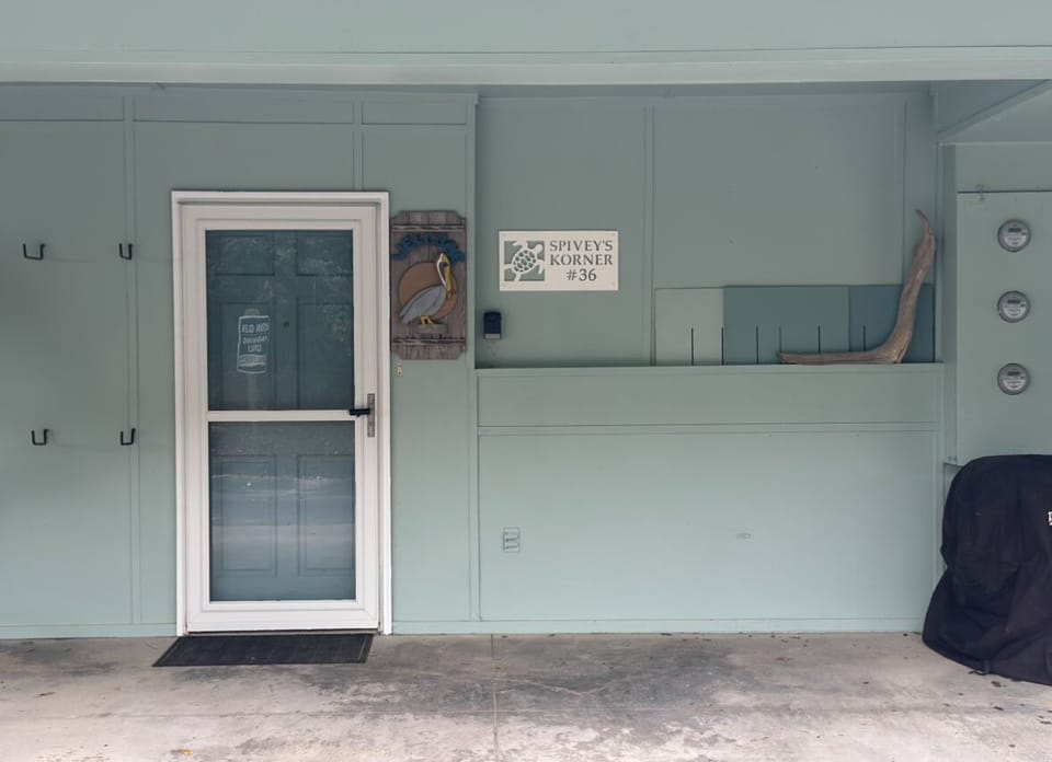 Welcome to Spivey’s Korner. Covered parking right by the laundry room door.