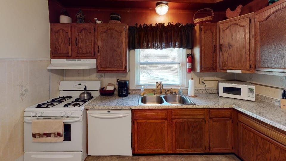 Kitchen. Equipped with all amenities necessary for a getaway. Just bring food.