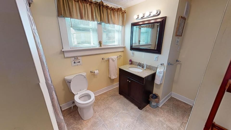 Full bathroom located on the main floor. Laundry facilities located here. 