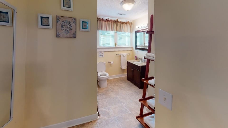 Full bathroom located on the main floor. Laundry facilities located here. 