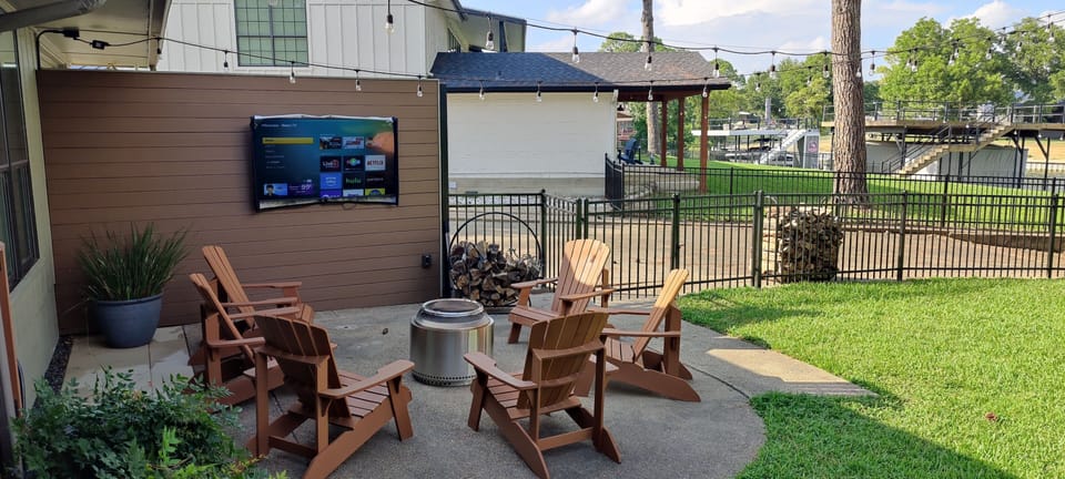New outdoor TV entertainment area with SoloStove firepit for perfect evenings