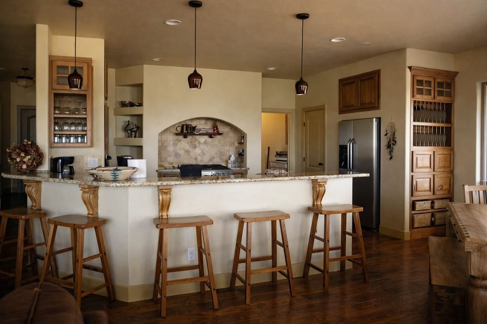 Gourmet Kitchen with built- ins and breakfast bar with 5 bar stools