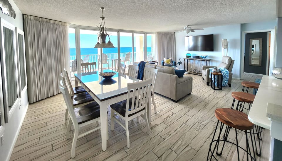 Living and dining area with view to fabulous balcony