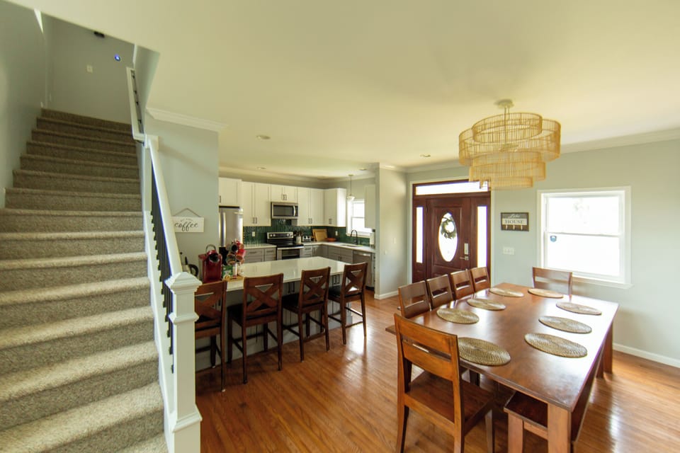 Large dining table, can seat 8-10, and counter area which seats 4