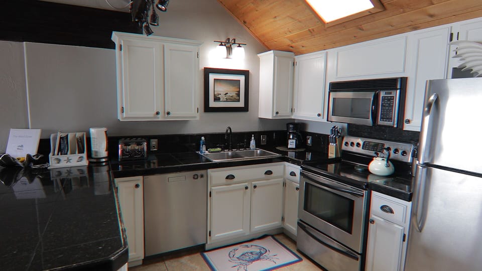 kitchen and breakfast bar on main floor